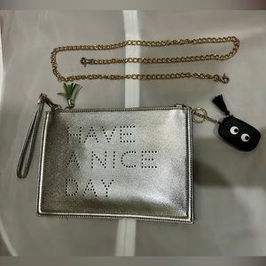 Silver vegan leather clutch bag